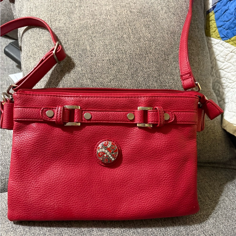 Red Leather Crossbody Bag with Decorative Accent